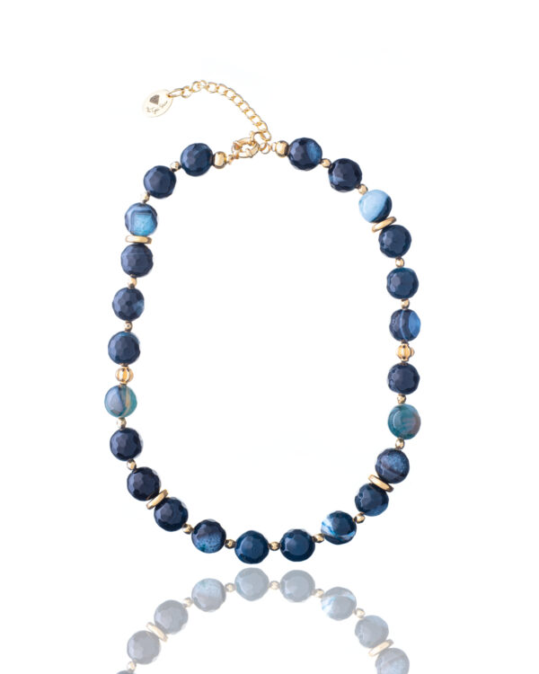 Blue jade necklace with gold accents and an extender chain
